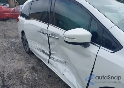 2023 Honda Odyssey Elite z USA, uszkodzony, nr VIN 5FNRL6H91PB008270